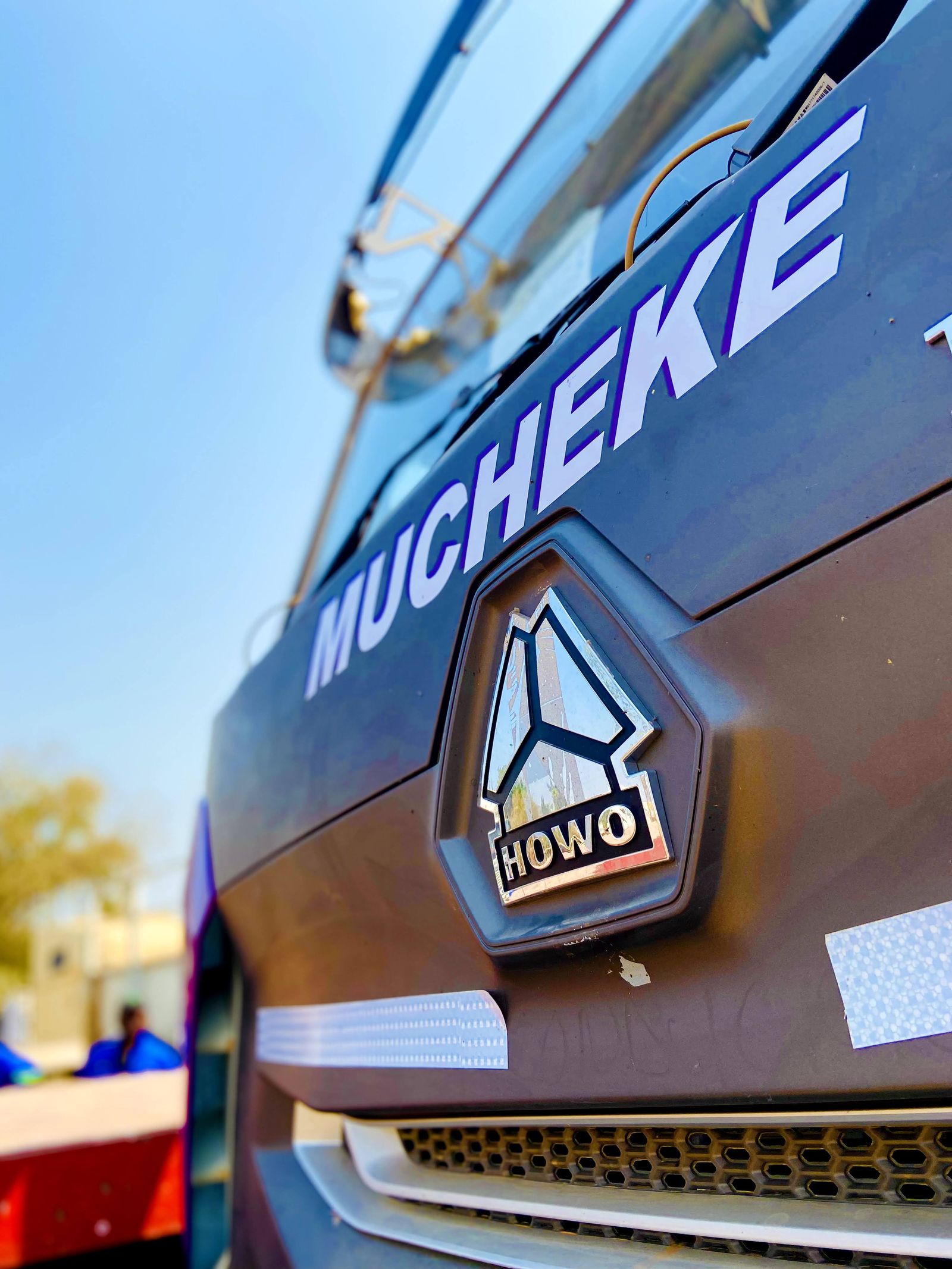 Close-up of a Barapate truck front and badge